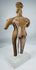 Pre-Columbian West Mexican terracotta female figure representing the distinctive Colima gingerbread sculptural tradition.