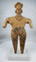 Ancient West Mexican Colima terracotta figure depicting a standing female with stylized facial features and ceremonial ornamentation.