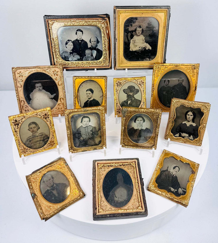 Civil War-era portrait photograph collection with gilt-brass mats, decorative cases, and historic family images