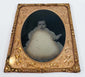 Mid-19th-century cased portrait of a young child wearing patterned period clothing