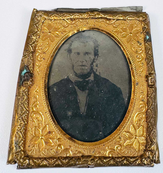 Mid-19th-century family group photograph displayed in a decorative period cased portrait mount