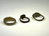 Ancient bronze finger ring collection showing three distinct bezel and band designs