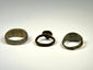 Heavy Roman to Medieval bronze ring with broad band and mottled green and brown oxidation
