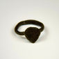 Medieval bronze ring with heart-shaped or shield-form bezel and naturally aged patinated surface