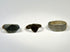 Group of three ancient bronze finger rings spanning the Roman to Medieval periods