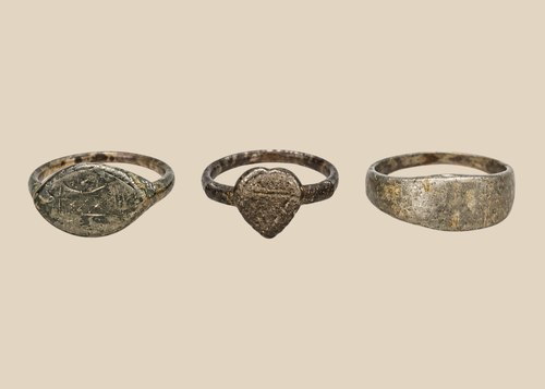 Set of three ancient European bronze finger rings with aged patina