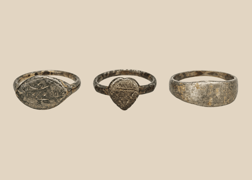 Set of three ancient European bronze finger rings with aged patina