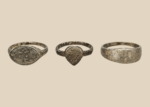 Set of three ancient European bronze finger rings with aged patina