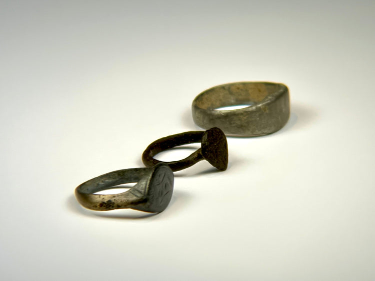 Medieval European bronze ring featuring a distinctive heart-shaped or shield-style bezel