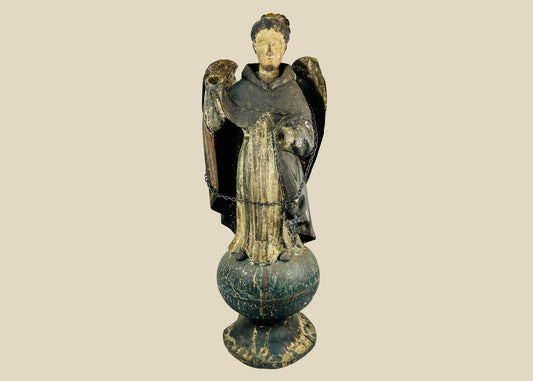 Antique Colonial Latin American polychrome wooden angel or saint figure, 18th–19th century, standing on orb base, gilded wings, remnants of original painted surface, later added sterling silver chain and cross marked 'Sterling, Mexico', traditional folk-religious craftsmanship
