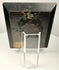 Rear view of worn ebonized frame with metal ring for hanging