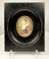 Continental miniature portrait of young woman in lace ruff, ebonized frame