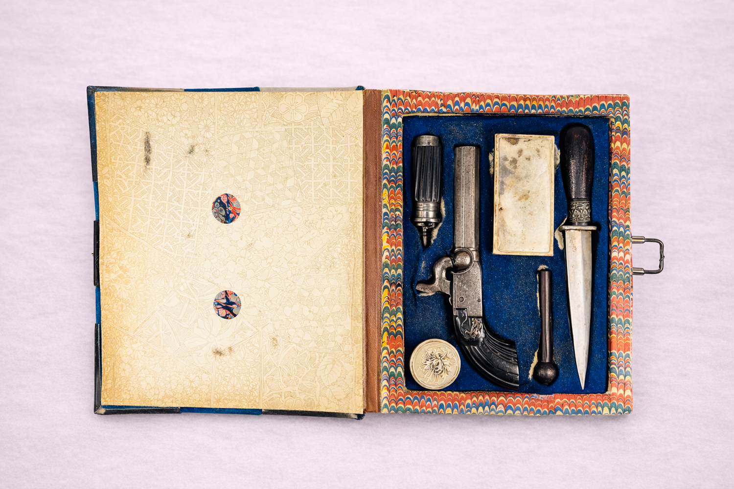Continental concealed gentleman’s defense set in velvet book-form case with pistol and dagger, circa 1855–1885