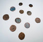Assorted Crusader coinage with irregular flans, worn legends, and religious symbols