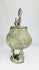 Dogon spiritual bronze container with anthropomorphic design and aged patina.
