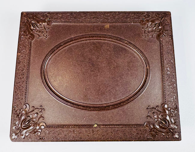 Historic ambrotype portrait set featuring Victorian clothing, ringlet curls, and original fittings