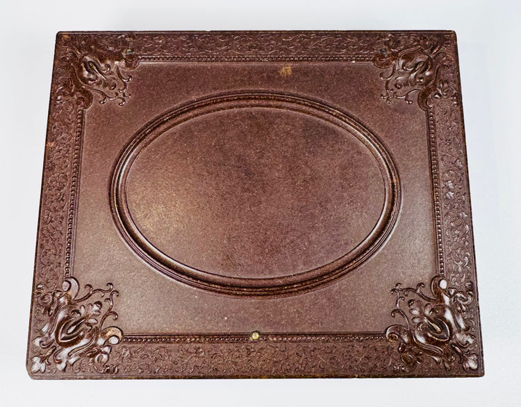 Historic ambrotype portrait set featuring Victorian clothing, ringlet curls, and original fittings