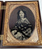 Victorian photographic case containing portraits of a formally dressed man and woman