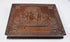 Ornate thermoplastic photographic case with paired male and female ambrotype portraits