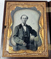 Two original glass ambrotypes housed in a molded floral union case