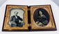 Antique Victorian ambrotype portrait pair with gilt brass mats and velvet lining