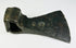 Close-up of historic European axe head displaying forging texture and oxidation