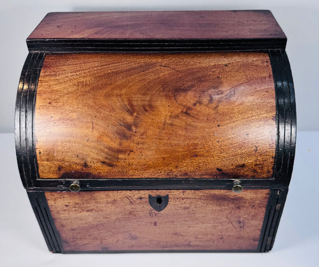 Closed Georgian mahogany spirit box showing polished wooden case, brass hardware and period craftsmanship