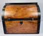 Early 19th century mahogany decanter case displaying rich wood grain, hinged construction and brass fittings