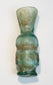 Pale blue-green Islamic glass vessel with iridescence and archaeological weathering