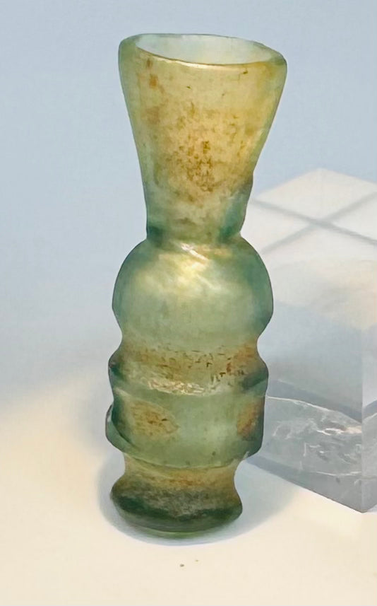 Western Asian blown glass vessel with rounded central body and tubular lower section