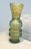 Western Asian blown glass vessel with rounded central body and tubular lower section