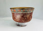 Early Nazca polychrome terracotta bowl with geometric and circular painted motifs, Peru, circa 100–300 AD.