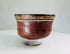 Pre-Columbian Nazca culture ceramic bowl featuring red, black, and cream polychrome decoration, Early Nazca period.