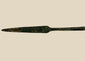 Ancient Cypriot bronze spearhead from the Early Bronze Age, Early Cypriot III period (c. 2500–1900 BCE). Leaf-shaped blade with raised central ridge, straight tang, and four-sided midsection for strength. Functional and ceremonial weapon reflecting Bronze Age metallurgy, hunting, and martial traditions in Eastern Mediterranean societies.