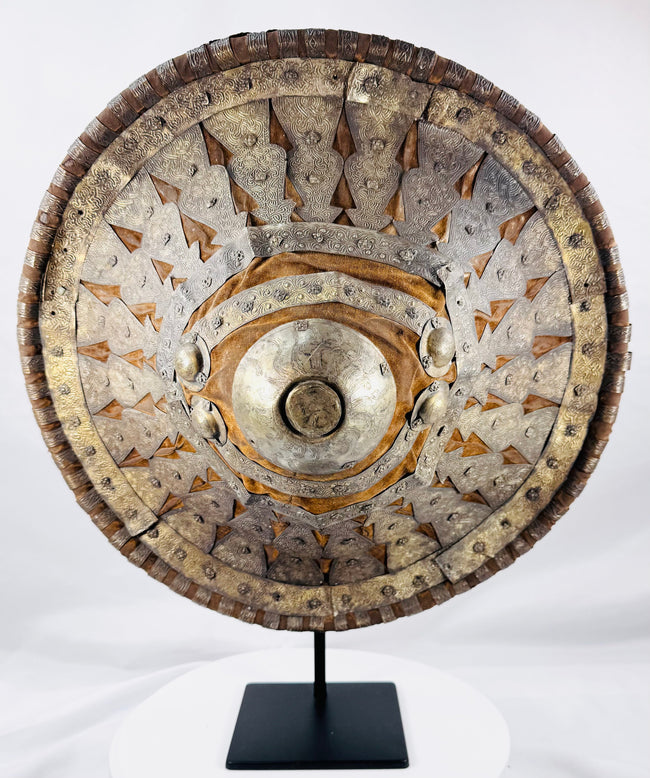 Antique Ethiopian nobleman’s shield with velvet, embossed metal mounts, and aged patina