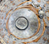 Detail of the large central boss with radiating foliate decoration on an Ethiopian shield