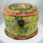 Early 1900s collar box with floral and bird design, fabric trim and hinged lid