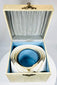 Antique detachable collar box with silk interior and decorative relief exterior
