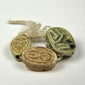 Ancient Egyptian scarab amulet group dating circa 600–200 BCE, representing rebirth, regeneration, and spiritual protection.