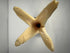Egyptian-inspired bone decorative objects with stylized floral carving and modern display bases