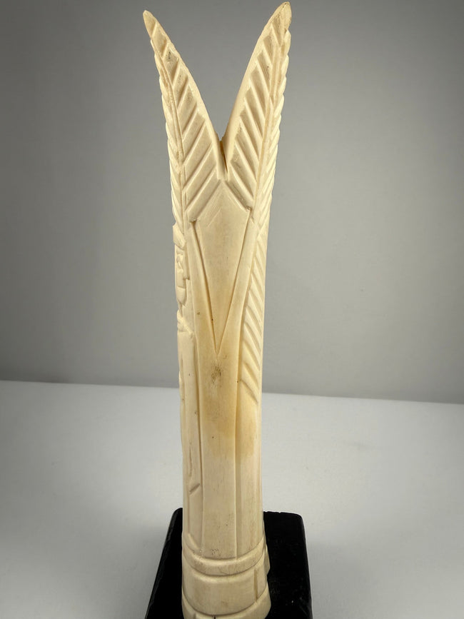 Pair of Egyptian-style bone candlesticks symbolizing rebirth vitality and the Nile