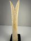Pair of Egyptian-style bone candlesticks symbolizing rebirth vitality and the Nile