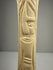 Antique carved bone candlesticks with lotus and papyrus symbolism from early 20th-century Egypt