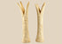 Pair of carved Egyptian ivory sistrum handles on black display bases, featuring stylized figures and decorative motifs, dating to the Third Intermediate Period, circa 1070–664 BCE.
