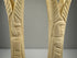 Hand-carved bone candlestick holders from Egypt with stylized lotus and papyrus forms