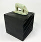 Ancient Egypt shrew-mouse amulet, pale green faience with mineral accretions, votive temple offering.