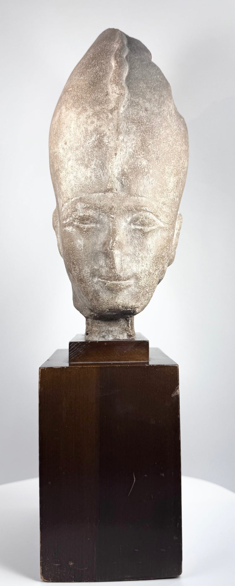 Front view of a 20th-century Egyptian Revival royal head with a grey stone-effect finish