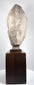 Front view of a 20th-century Egyptian Revival royal head with a grey stone-effect finish