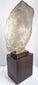 Opposite profile of the Egyptian-inspired royal portrait sculpture with weathered grey surface