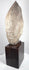 Side view of the Egyptian Revival pharaoh head showing its tall White Crown and hardwood base
